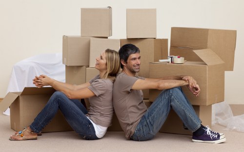 Local removals team handling furniture in Highgate