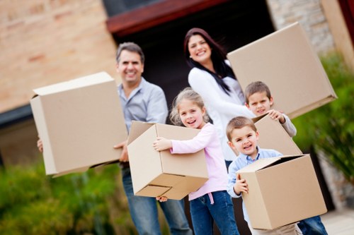 Careful wrapping and box labelling during a Highgate packing service