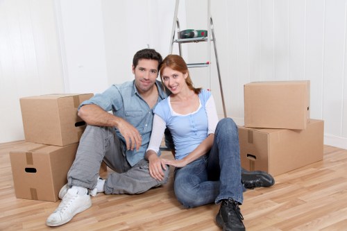 Packed moving boxes and household items ready for a home removal in Highgate