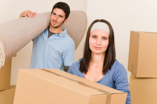 Loading furniture into a removal van for a Highgate home move