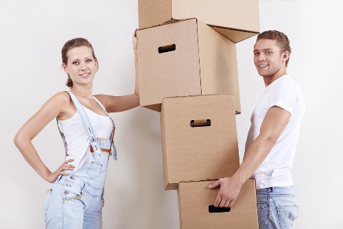 Local movers organising packed boxes in Highgate before transport