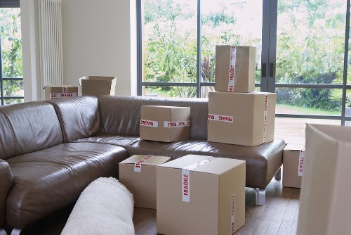Highgate house moving team unloading furniture and boxes at a new home