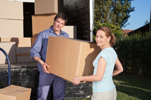 Careful loading of boxes and furniture for a move in Highgate